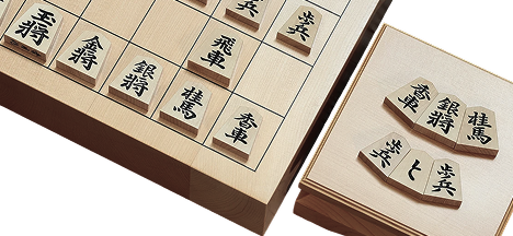 Captured shogi pieces on a piece stand